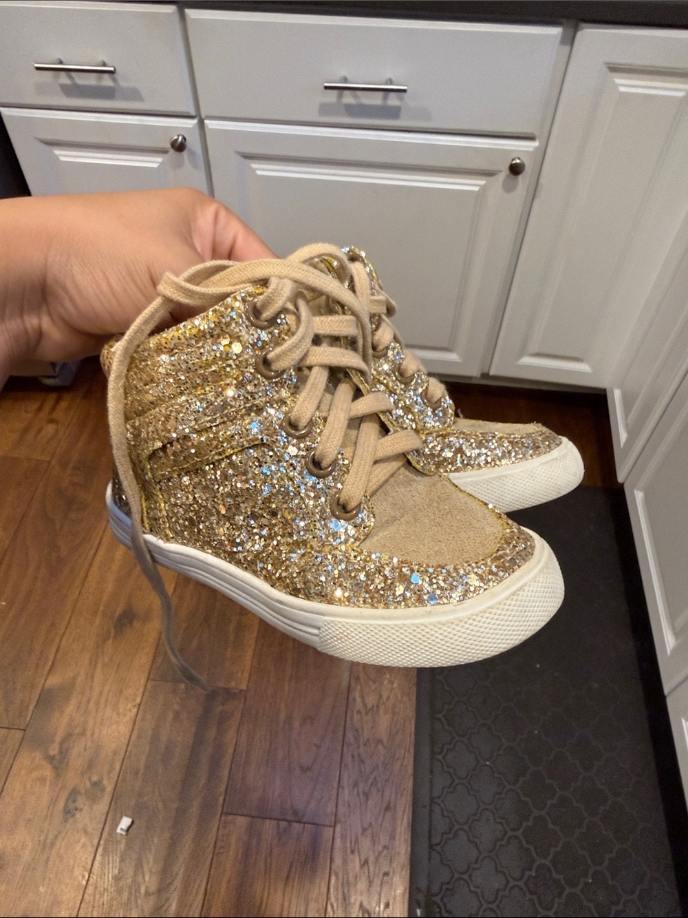 Gold sparkle high top shoes